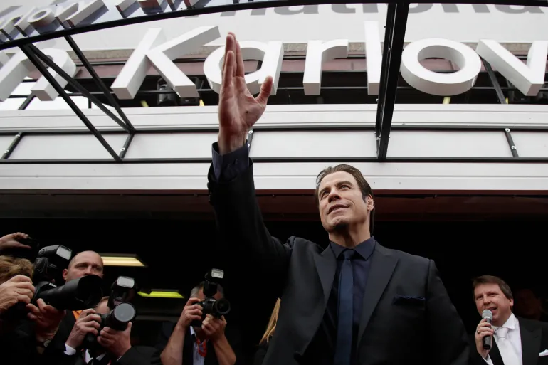 U.S. actor John Travolta arrives at the opening ceremony of the 48th Karlovy Vary International Film Festival in Karlovy Vary June 28, 2013. REUTERS/David W Cerny (CZECH REPUBLIC - Tags: ENTERTAINMENT)