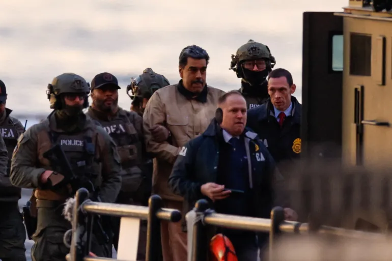 Captured Venezuelan President Nicolas Maduro arrives at the Downtown Manhattan Heliport, as he heads towards the Daniel Patrick Manhattan United States Courthouse for an initial appearance to face U.S. federal charges including narco-terrorism, conspiracy, drug trafficking, money laundering and others in New York City, U.S., January 5, 2026. REUTERS/Eduardo Munoz