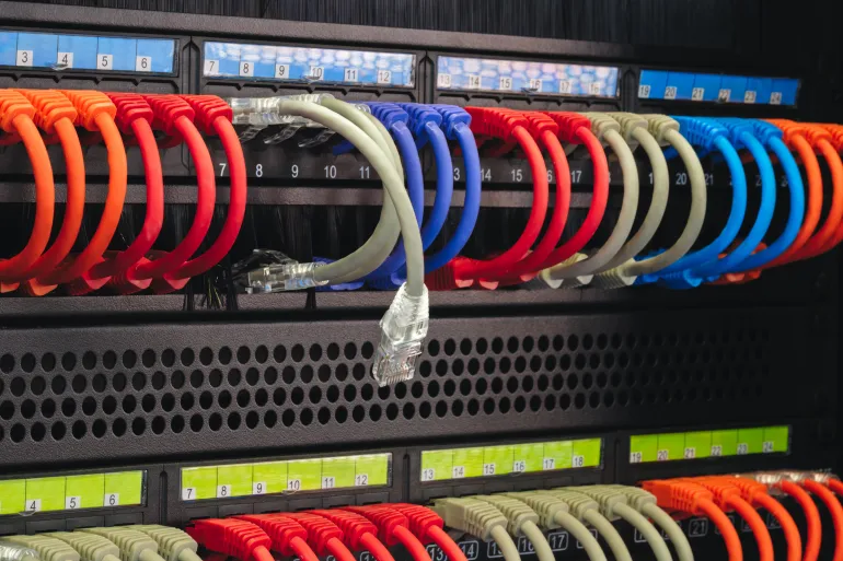 cables with different colors numbers. Cables are connected to black box, one cable is not connected, broken connection, no connection, disconnected internet communication problem concept background