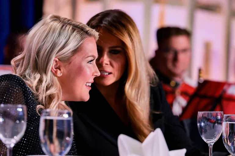 U.S. first lady Melania Trump and White House Press Secretary Karoline Leavitt attend the annual White House Correspondents' Association dinner in Washington, D.C., U.S., April 25, 2026. REUTERS/Jonathan Ernst