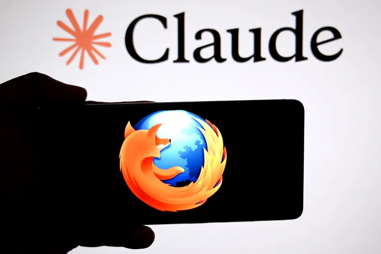 INDIA - 2026/05/06: In this photo illustration, a Mozilla Firefox logo is seen displayed on a smartphone with a Claude mythos logo in the background. (Photo Illustration by Avishek Das/SOPA Images/LightRocket via Getty Images)