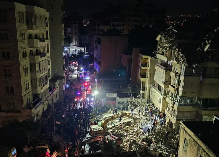 First responders gather at the site of an Israeli airstrike in Beirut’s southern suburb of Haret Hreik neighborhood on May 6, 2026.
