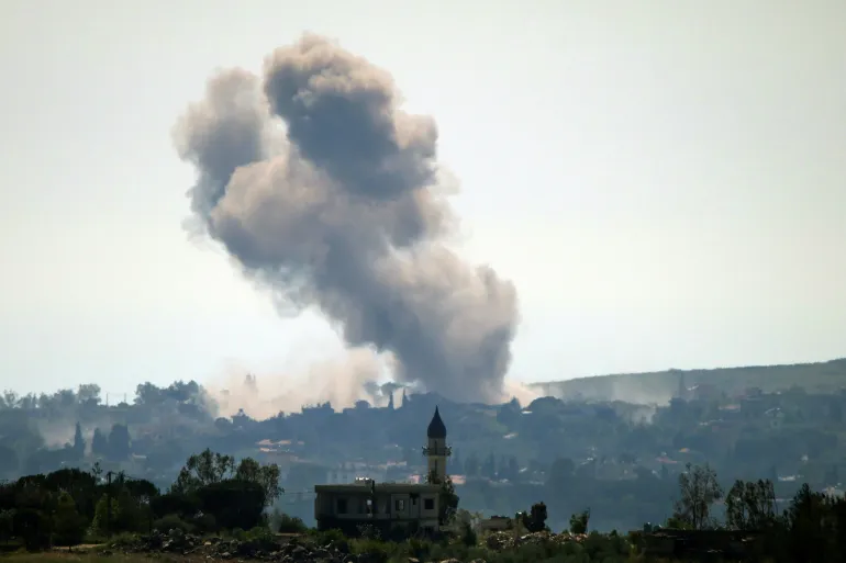 CORRECTION / This photograph taken from the southern Lebanese area of Marjeyoun shows smoke rising from the site of an Israeli airstrike that targeted the village of Zawtar al-Gharbiyeh on May 11, 2026.