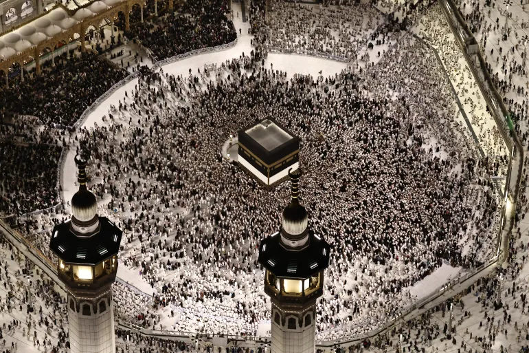 This aerial view shows the Grand Mosque complex in Mecca, as Muslims perform the evening prayer around the Kaaba, Islam's holiest shrine, on May 24, 2026, ahead of the annual Hajj pilgrimage.