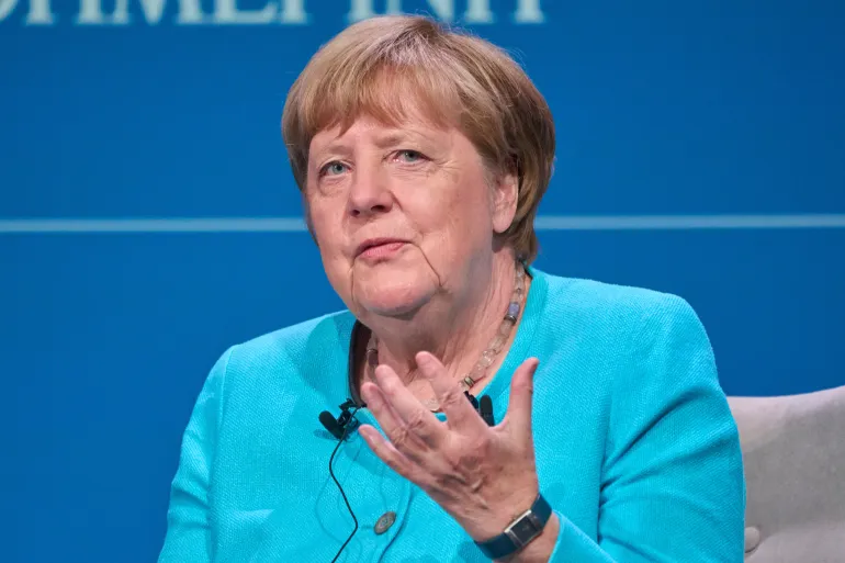 FILE - Former German Chancellor Angela Merkel speaks during the presentation of her book "Freedom" at the Stavros Niarchos Foundation Cultural Center in Athens, Greece, on July 2, 2025. (AP Photo/Petros Giannakouris, File)