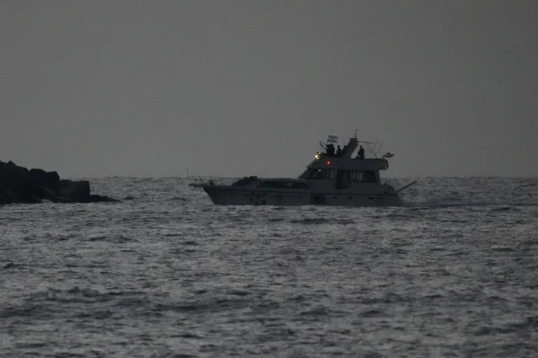 Israeli naval forces sail a confiscated Gaza-bound flotilla boat into Israel's Ashdod port after intercepting the vessel on the Mediterranean Sea, Tuesday, May 19, 2026. (AP Photo/Ariel Schalit)