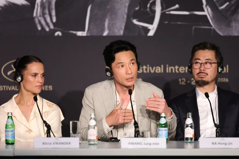 epa12970937 (L-R) Alicia Vikander, Hwang Jeong-min and Na Hong-jin attend the press conference for 'Hope' during the 79th annual Cannes Film Festival, in Cannes, France, 18 May 2026. The film festival runs from 12 to 23 May 2026. EPA/ANDREAS RENTZ / POOL *** Local Caption *** CANNES, FRANCE - MAY 16: Simon Jacquet and Marion Cotillard speak during the "Karma" press conference at the 79th annual Cannes Film Festival at Palais des Festivals on May 16, 2026 in Cannes, France. (Photo by Amy Sussman/Getty Images)