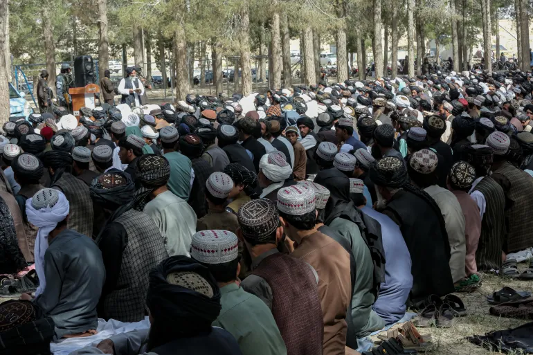 epa12996984 Afghan Muslims perform prayers on the first day of Eid al-Adha in Kabul, Afghanistan, 27 May 2026. Eid al-Adha, also known as the Feast of Sacrifice, coincides with the annual Hajj pilgrimage to Mecca and is traditionally marked by the sacrifice of livestock and the distribution of meat among family, friends and those in need. EPA/SAMIULLAH POPAL