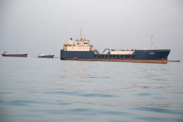 BANDAR ABBAS, IRAN - APRIL 22: Ships are anchored near the shoreline on April 22, 2026 in Bandar Abbas, Iran. Bandar Abbas is a port city and the capital of Hormozgan Province, along the Persian Gulf and Strait of Hormuz. Earlier today, Iran's Islamic Revolutionary Guards Corps said it had attacked and seized two ships near the Strait of Hormuz as it tried to assert control over the critical waterway. The incidents came the day after U.S. President Donald Trump announced an extension of a ceasefire between his country and Iran, and after Iran refused to attend the latest proposed round of peace talks in Islamabad. (Photo by Getty Images)
