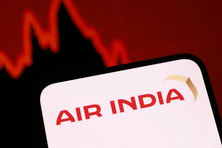 FILE PHOTO: Air India logo and a decreasing stock graph are seen in this illustration taken May 13, 2026. REUTERS/Dado Ruvic/Illustration/File Photo