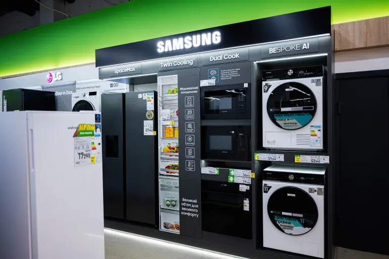 Lviv, Ukraine - March 17, 2025: A variety of advanced kitchen and laundry appliances are arranged in Samsung electronic store.