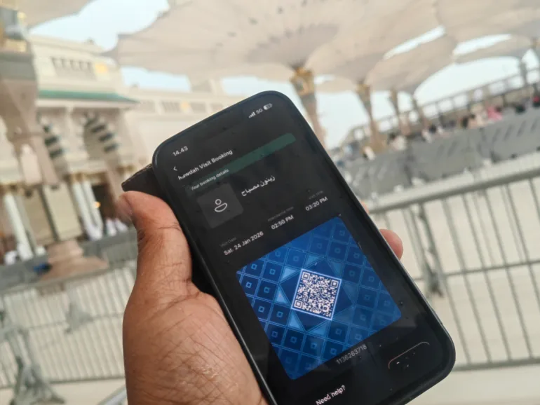 Madinah, Saudi Arabia - January 24 2026: mobile application of nusuk for performing hajj pilgrimage, raudhah