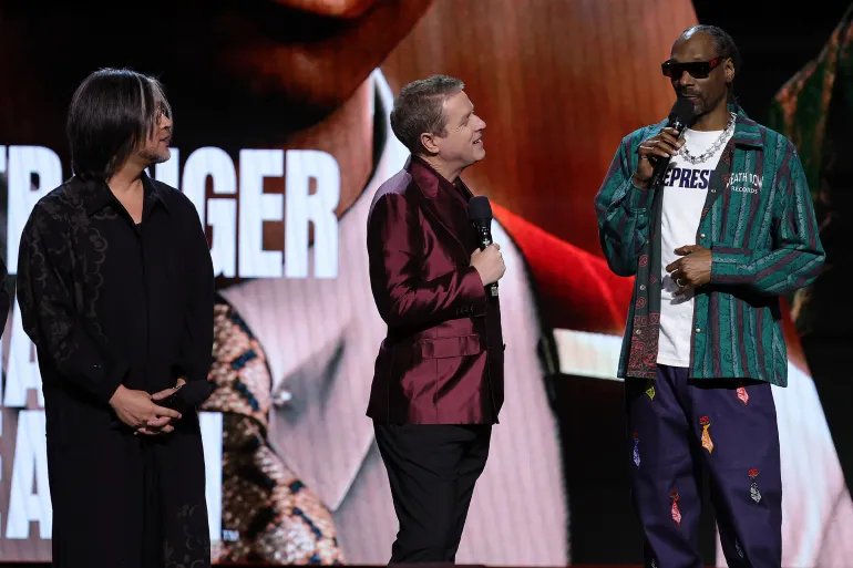 HOLLYWOOD, CA - JUNE 5: (L-R) Masayoshi Yokoyama, Geoff Keighley and Snoop Dogg speak onstage during the “Summer Game Fest 2026” at Dolby Theatre on June 5, 2026 in Hollywood, California. (Photo by Frank Micelotta/Summer Game Fest via Getty Images)