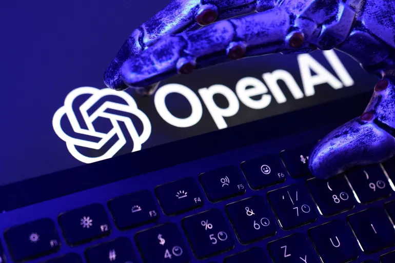OpenAI logo, a keyboard, and a robotic hand in this illustration taken June 5, 2026. REUTERS/Dado Ruvic/Illustration