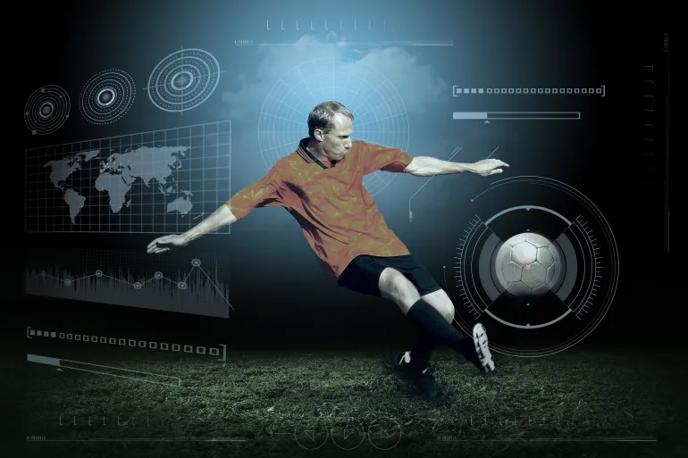 Soccer player with ball in action outdoors