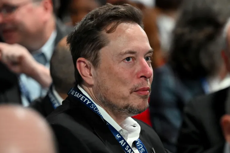 BLETCHLEY, ENGLAND - NOVEMBER 1: Tesla and SpaceX's CEO Elon Musk attends the first plenary session on Day 1 of the AI Safety Summit at Bletchley Park on November 1, 2023 in Bletchley, England. The UK Government are hosting the AI Safety Summit bringing together international governments, leading AI companies, civil society groups and experts in research to consider the risks of AI, especially at the frontier of development, and discuss how they can be mitigated through internationally coordinated action. (Photo by Leon Neal/Getty Images)