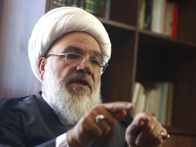 Former secretary general of Hezbollah Sheikh Subhi Tufayli, talks during an interview with Reuters in his office in Baalbeck in the Bekaa Valley, July 1, 2013. The former head of the powerful Shi'ite group Hezbollah said the group's intervention in Syria's civil war has set off a regional sectarian struggle. Tufayli, who led Hezbollah from 1989 to to 1991 said he believed the guerrilla movement did not choose to send its fighters to support President Bashar al-Assad, rather the group was forced to join under pressure from Iran, its shared patron with Assad. Picture taken July 1, 2013. REUTERS/Jamal Saidi (LEBANON - Tags: POLITICS)