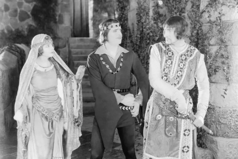 Enid Bennett, Douglas Fairbanks and Sam De Grasse in a scene from the film 'Robin Hood', 1922. (Photo by United Artists/Getty Images)
