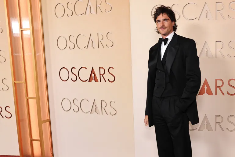 Jacob Elordi poses on the red carpet during the Oscars arrivals at the 98th Academy Awards in Hollywood, Los Angeles, California, U.S., March 15, 2026. REUTERS/Daniel Cole