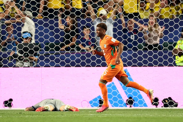 Ivory Coast's forward #15 Amad Diallo (R) celebrates scoring his team's first goal past Ecuador's goalkeeper #01 Hernan Galindez (L) during the 2026 World Cup Group E football match between Ivory Coast and Ecuador at the Philadelphia Stadium in Philadelphia on June 14, 2026.