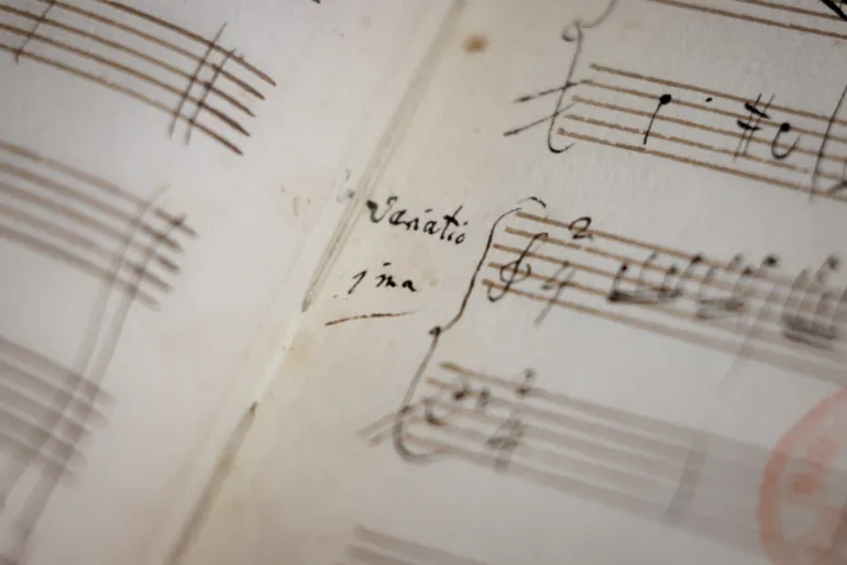 This photograph taken on June 15, 2026, shows an original fragment of Wolfgang Amadeus Mozart’s music handwritten notebook at Richelieu Library (Bibliotheque Nationale de France-National Library of France-BnF) in Paris.