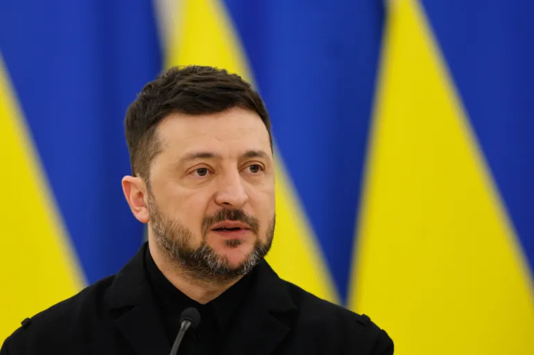Ukrainian President Volodymyr Zelenskyy speaks during a joint press conference with Lithuania's President Gitanas Nauseda and Polish President Karol Nawrocki, at the Presidential palace in Vilnius, Lithuania, Sunday, Jan. 25, 2026. (AP Photo/Mindaugas Kulbis)