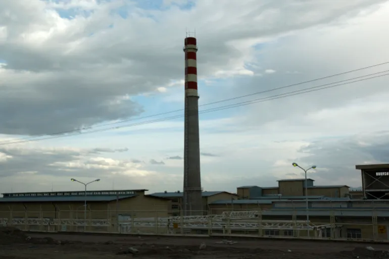 In this picture taken April 9, 2009 the exterior view of Iran's Uranium Conversion Facility outside the city of Isfahan, 255 miles (410 kilometers) south of the capital Tehran is photographed. Iran is lagging behind on equipping a bunker with machines enriching uranium to a grade that can be turned quickly to arm nuclear warheads and now says will produce less at the site than originally planned, diplomats tell The Associated Press. The diplomats said that Iranian officials recently told the International Atomic Energy Agency that half of the approximately 1,000 centrifuges to be installed at the underground Fordow site will churn out uranium enriched to near 20 percent, while the rest will produce low-enriched material at around 3.5 percent. (AP Photo/Vahid Salemi)