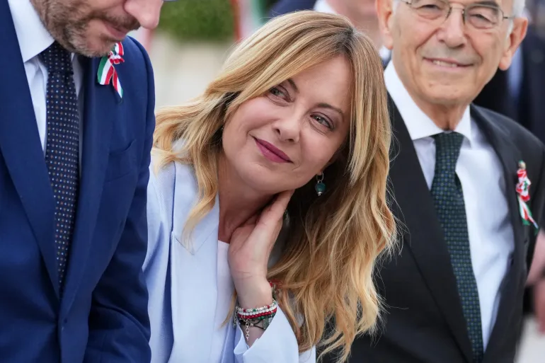 Italian Premier Giorgia Meloni arrives to attend the parade on the occasion of the 80th anniversary of the proclamation of the Italian Republic, in Rome, Tuesday, June 2, 2026. (AP Photo/Andrew Medichini)