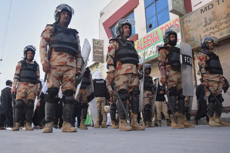 Pakistani paramilitary soldiers move ahead of a Shiite Muslim's procession in the mourning month of Muharram in Quetta, Pakistan, Tuesday, June 23, 2026. (AP Photo/Arshad Butt)