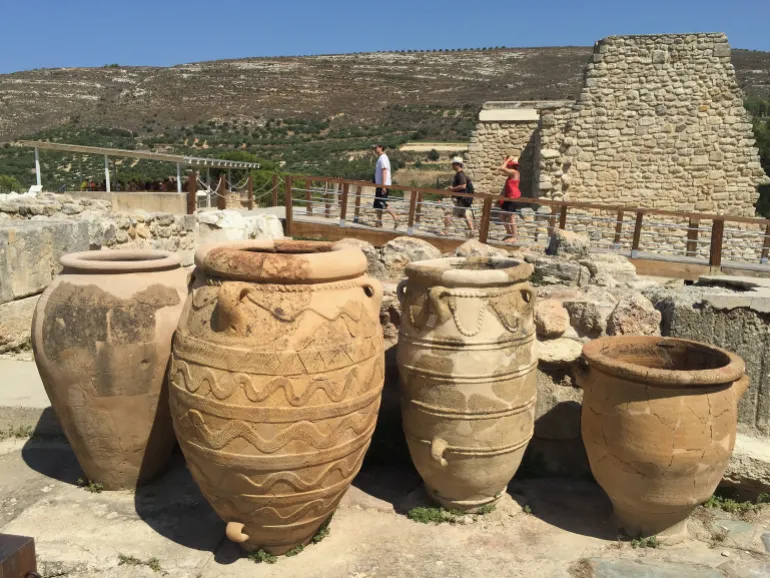 KNOSSOS, GREECE - AUGUST 22: (EDITOR'S NOTE: Photo taken with an iPhone 6.) Visitors walk among partially-reconstructed ruins of the ancient Minoan city of Knossos on the island of Crete on August 22, 2015 in Knossos, Greece. Knossos dates from the Bronze Age, is Europe's oldest known city and was excavated thoroughly in the early 20th century by British archaeologist Sir Arthur Evans. Crete is a popular summer tourist destinaiton. (Photo by Sean Gallup/Getty Images)
