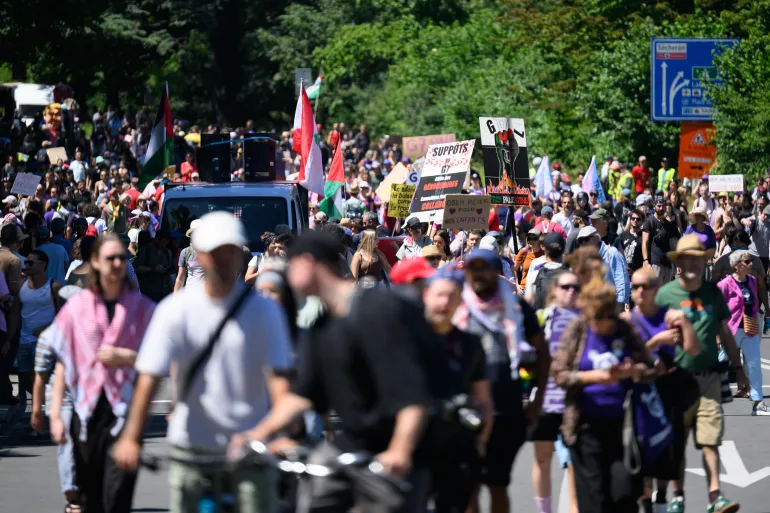 GENEVA, SWITZERLAND - JUNE 14: People gather during a protest ahead of the G7 Summit on June 14, 2026 in Geneva, Switzerland. This week's G7 summit will take place from June 15-17 in nearby Evian-les-Bains, France, as leaders grapple with challenges to peace and security for Ukraine and Europe, the situation in the Middle East, and other geopolitical issues. (Photo by Harold Cunningham/Getty Images)