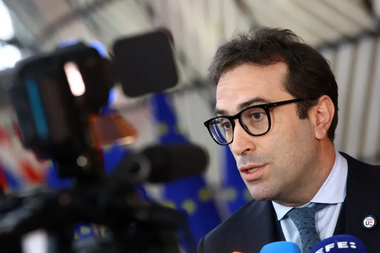 Spain's Economy Minister Carlos Cuerpo speaks to the media as he attends a Eurozone Finance Ministers meeting in Brussels, Belgium May 4, 2026. REUTERS/Yves Herman