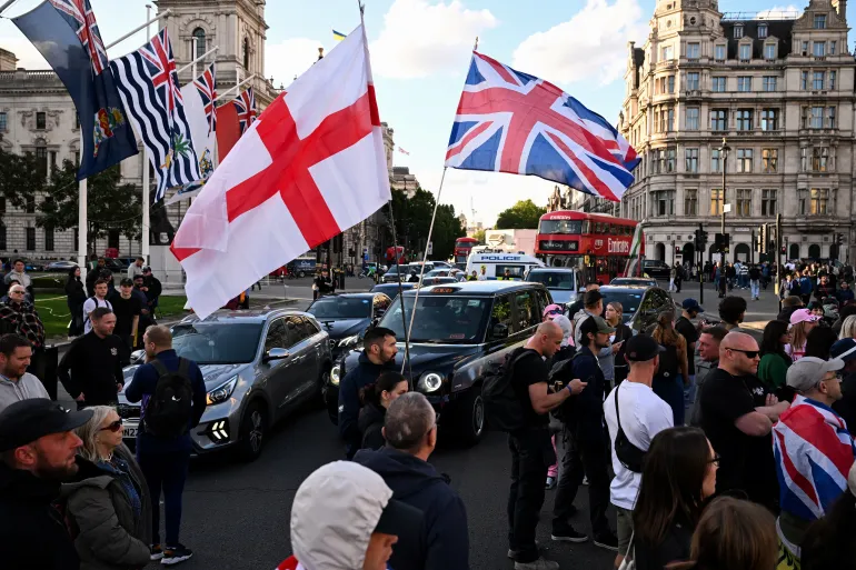 Protesters gather in Parliament Square following a knife attack in Belfast on June 8, that left a man seriously injured and prompted police to declare a critical incident, in London, Britain, June 9, 2026. REUTERS/Chris J. Ratcliffe