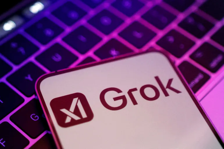 FILE PHOTO: xAI and Grok logos are seen in this illustration taken, February 16, 2025. REUTERS/Dado Ruvic/Illustration/File Photo