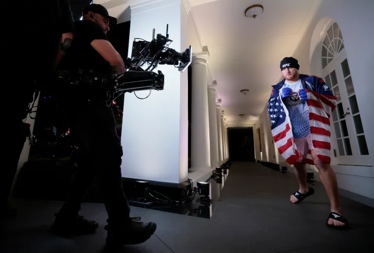 Justin Gaethje walks to his fight with Ilia Topuria in their lightweight championship bout at UFC Freedom 250 at the White House in Washington, D.C., U.S., June 15, 2026. REUTERS/Jonathan Ernst