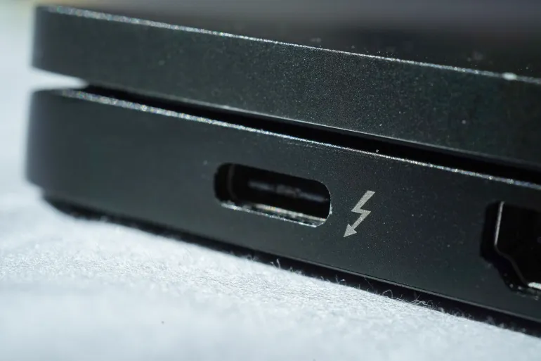 Closeup of a Thunderbolt 4 port on a black laptop